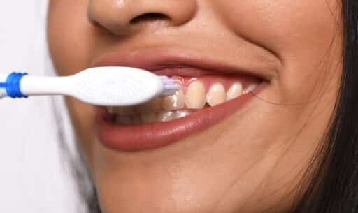 why do my gums bleed when I brush